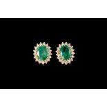 A PAIR OF DIAMOND AND EMERALD CLUSTER EARRINGS,