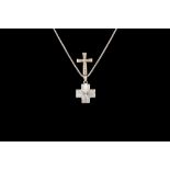 A 9CT DIAMOND SET CROSS,