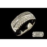 A DIAMOND PAVÉ DRESS RING, with diamonds of 1.03ct, mounted in 14ct white gold.