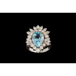A BLUE TOPAZ AND DIAMOND FANCY CLUSTER RING,