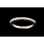 A DIAMOND HALF ETERNITY RING