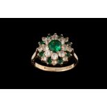 A GREEN AND WHITE GEM SET CLUSTER RING,