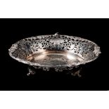 A MODERN CIRCULAR SILVER FRUIT BASKET, with applied vine leaf decoration, open pierced sides,