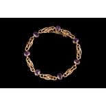 AN ANTIQUE AMETHYST SET BRACELET,