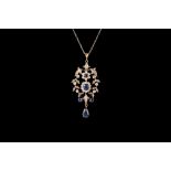 AN EDWARDIAN SAPPHIRE AND DIAMOND FLORAL PENDANT,