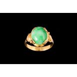 A JADEITE RING, with one oval cabochon jadeite of 4.30ct, with gem report.