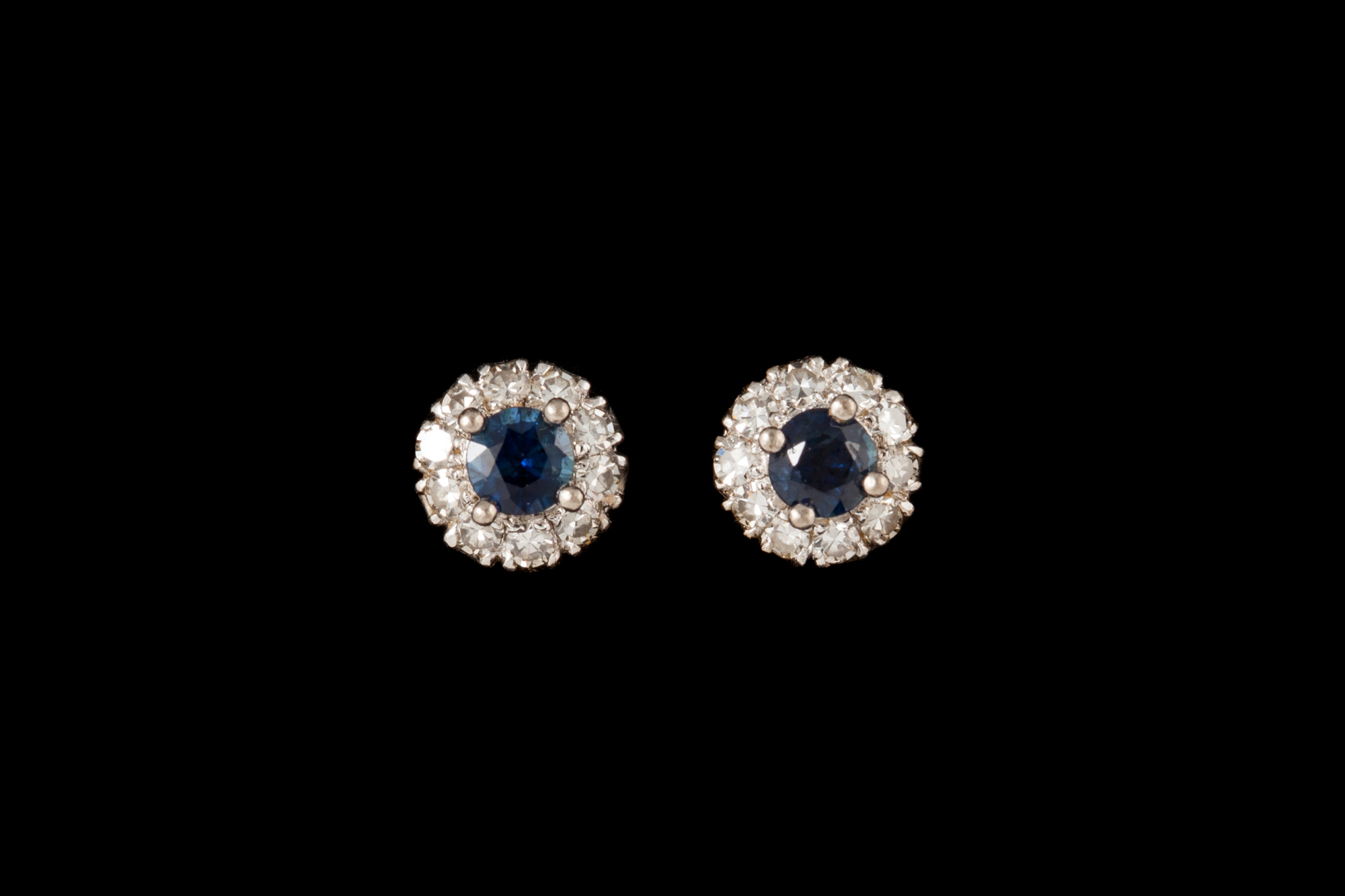 A PAIR OF SAPPHIRE AND DIAMOND CLUSTER EARRINGS