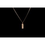 A 9CT GOLD INGOT, on chain, 15.7gms