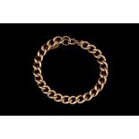 A 9CT GOLD CURB LINK BRACELET