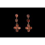 A PAIR OF GARNET DROP EARRINGS,