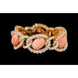 A CORAL AND DIAMOND BRACELET BY VAN CLEEF ET ARPELS, boxed, set with six carved oval cabochon corals