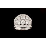 A DIAMOND GRADUATED BAND RING, with diamonds of approx 3.68ct in total.