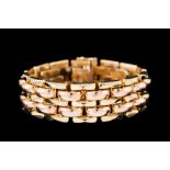 A 14CT YELLOW AND ROSE GOLD FIVE ROW BRACELET. Condition Report: 42.
