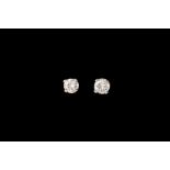 A PAIR OF DIAMOND STUD EARRINGS, of approx. 0.