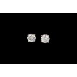 A PAIR OF DIAMOND SOLITAIRE STUD EARRINGS, two round brilliant cut diamonds of approx 1.