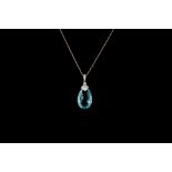 AN AQUAMARINE AND DIAMOND PENDANT AND CHAIN, with one briolette aquamarine of approx 15.35ct and