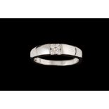 A DIAMOND SET BAND RING,