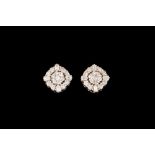 A PAIR OF DIAMOND CLUSTER EARRINGS,