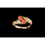 A CORAL AND DIAMOND SET DRESS RING, mounted in 18ct yellow gold, signed Denoir