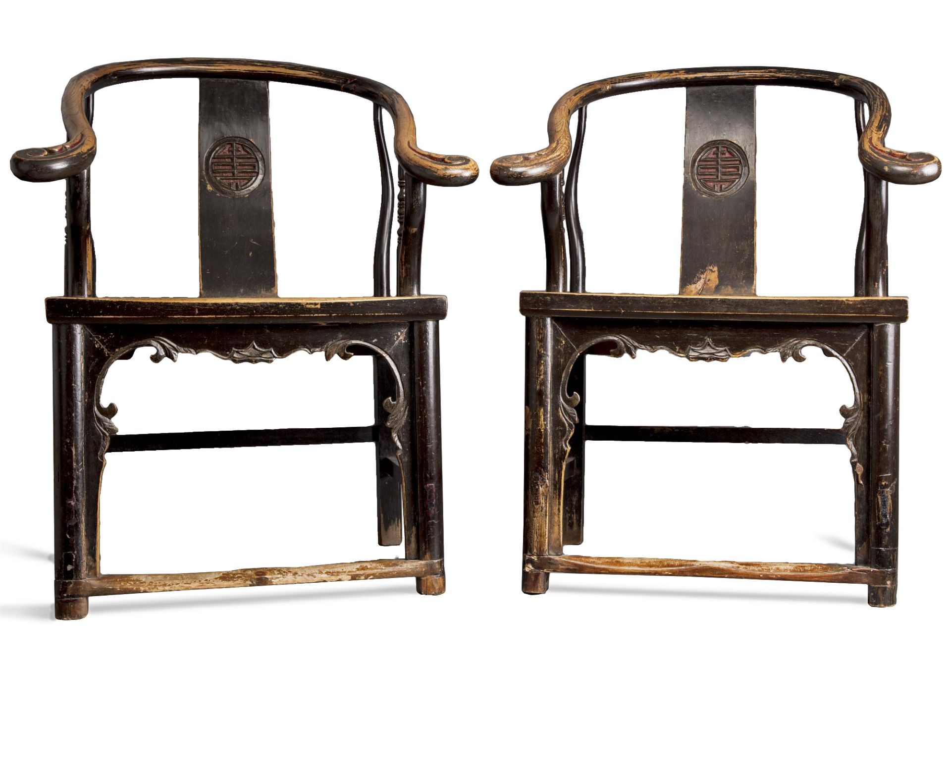 A pair of Chinese horseshoe-back armchairs