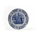 A large Chinese blue and white 'narrative' plate