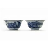 A pair of Chinese blue and white 'landscape' klapmuts bowls