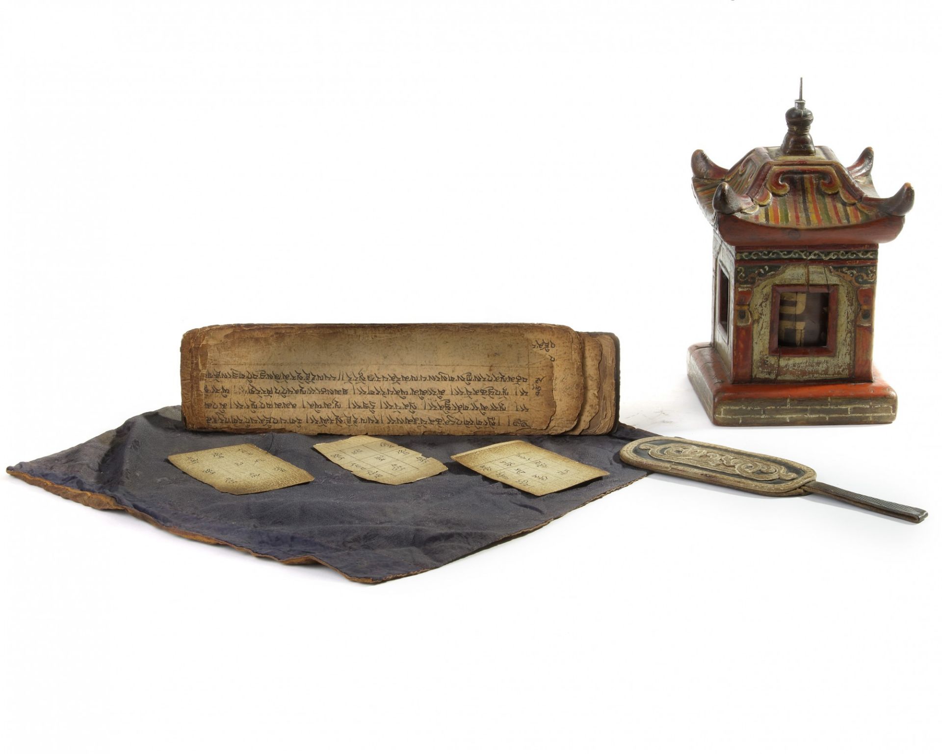 A small Mongolian leather bag, three manuscript sections and a wooden prayer wheel - Image 3 of 3