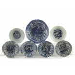 A group of seven Chinese blue and white moulded ‘Kraak porselein’ small bowls