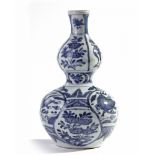 A Chinese blue and white moulded 'Kraak' 'seahorse' double-gourd vase