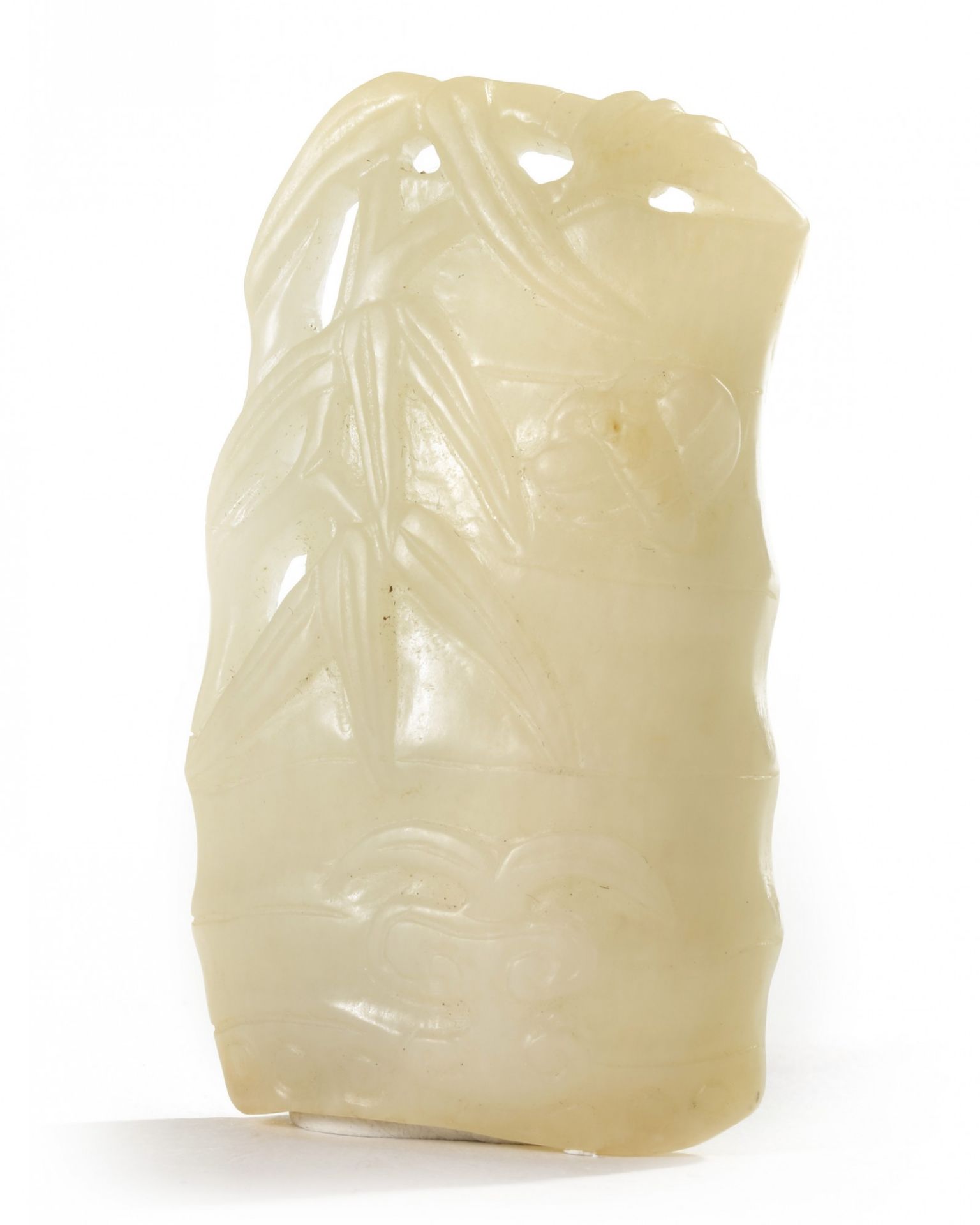 A Chinese pale celadon jade carving of bamboo