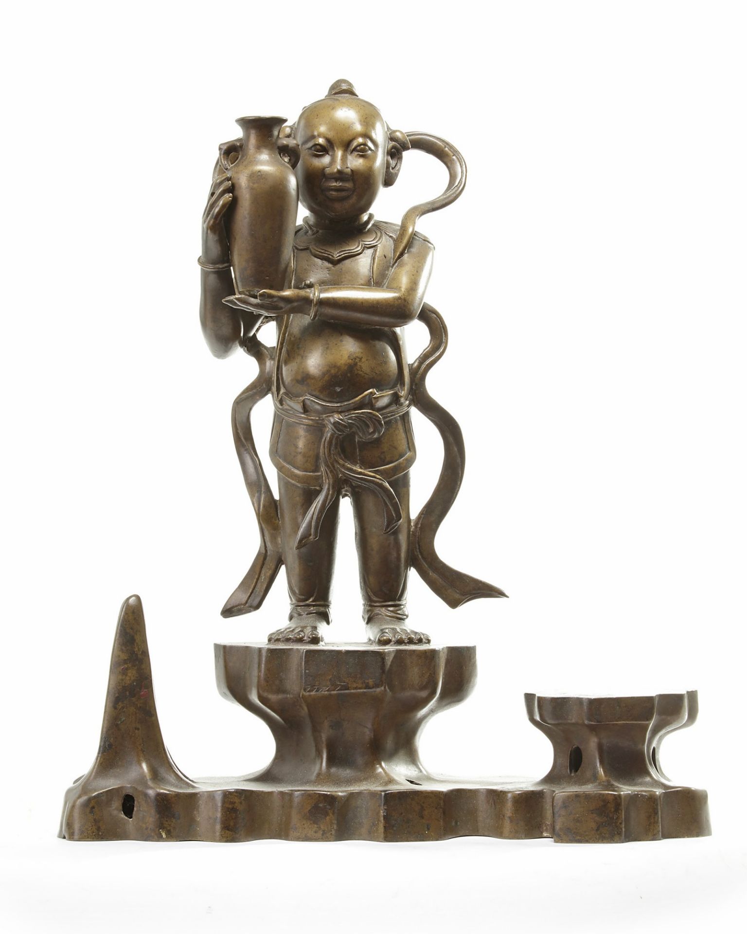 A large Chinese bronze standing boy