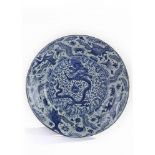 A Chinese blue and white 'dragon and fish' charger