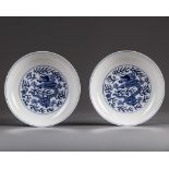 A pair of Chinese blue and white dragon dishes