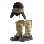 A Mongolian fur-trimmed felt hat and a pair of children's boots
