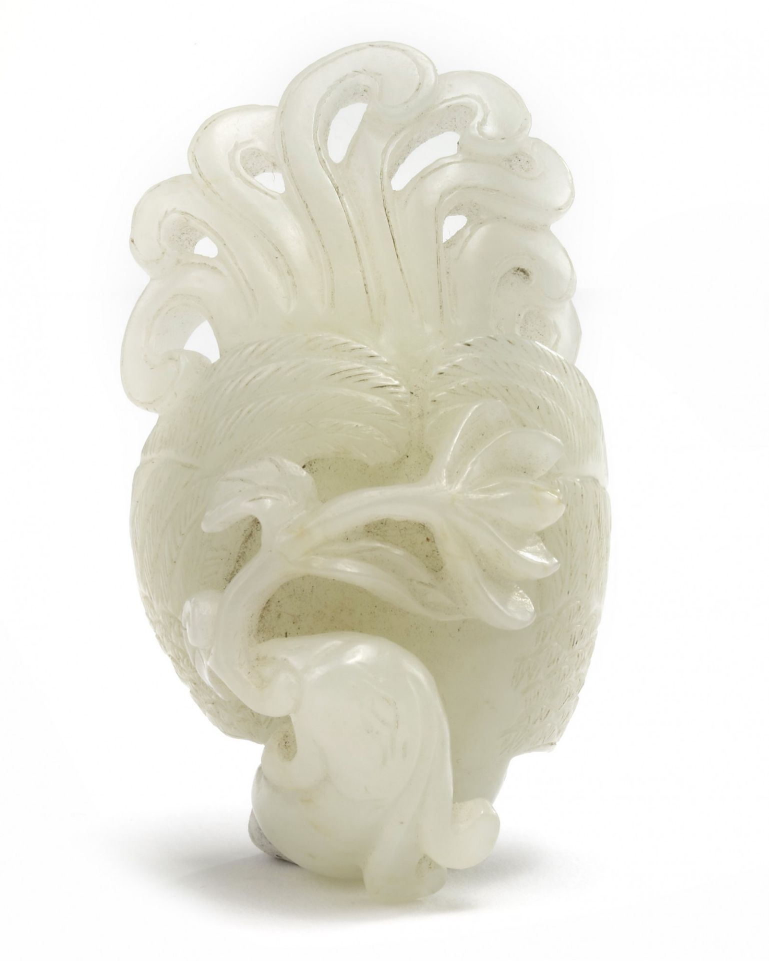 A Chinese pale celadon jade carving of a phoenix