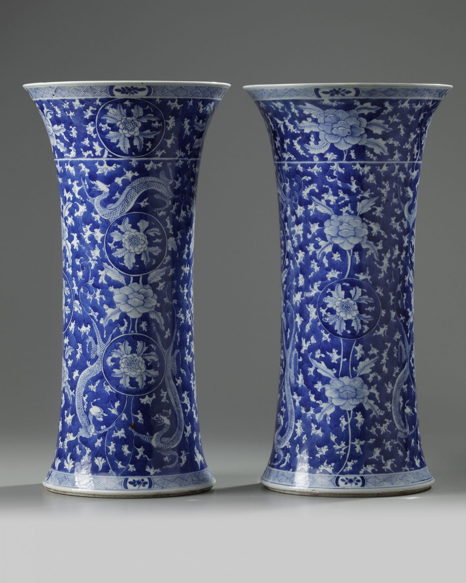A pair of Chinese blue and white 'qilin' gu vases