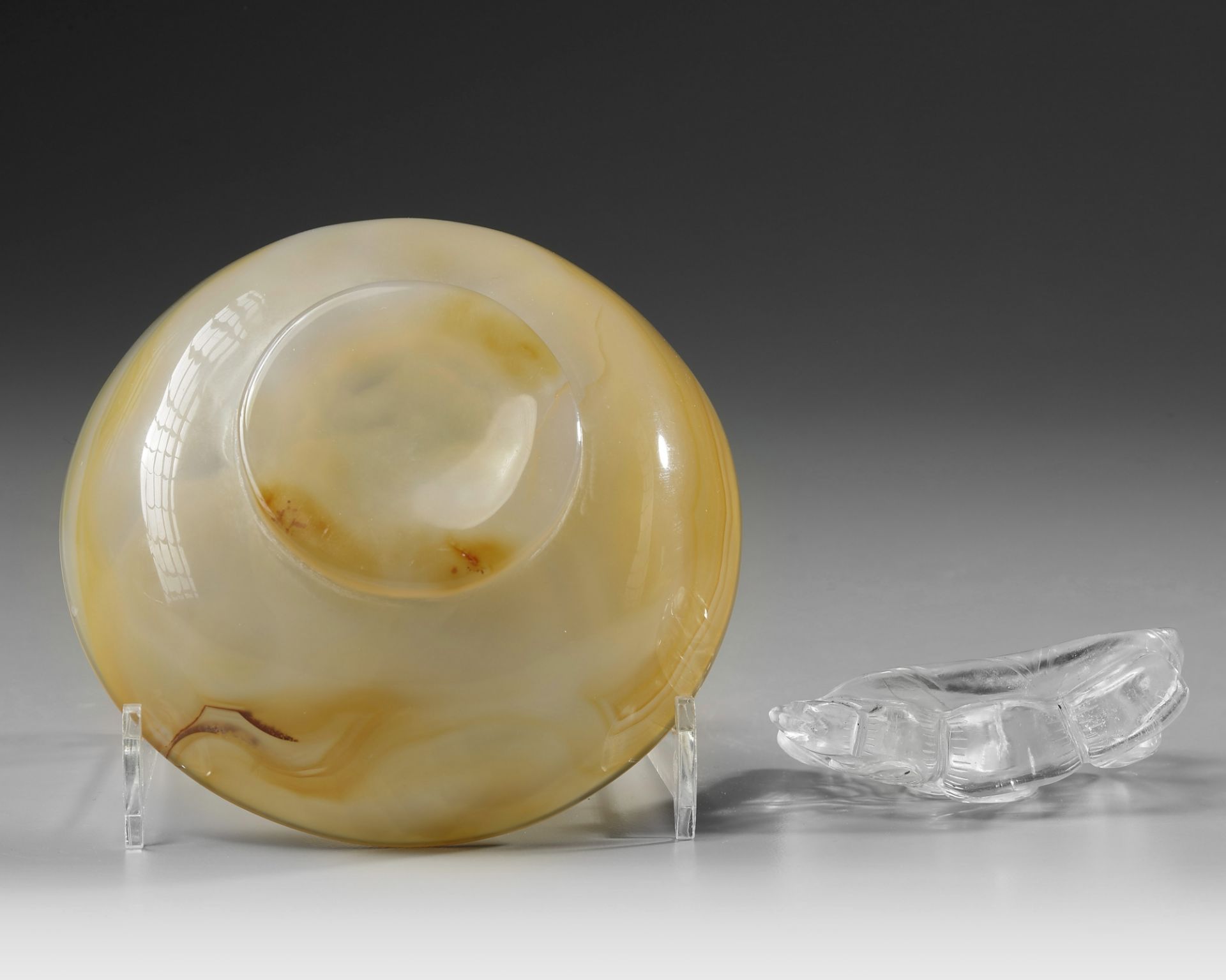 A Chinese rock crystal lotus-form washer and an agate washer - Image 2 of 2