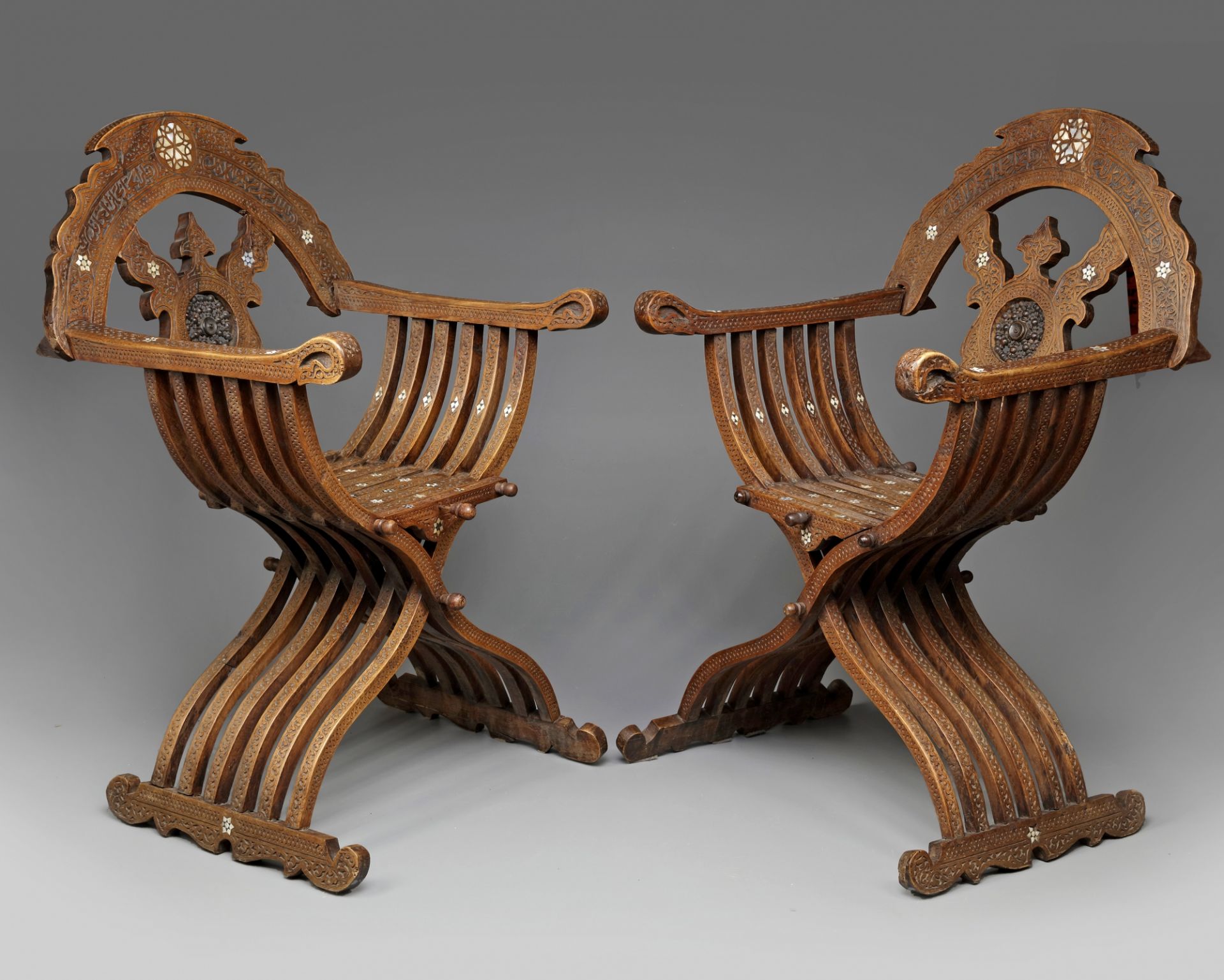 Two Islamic wooden chairs