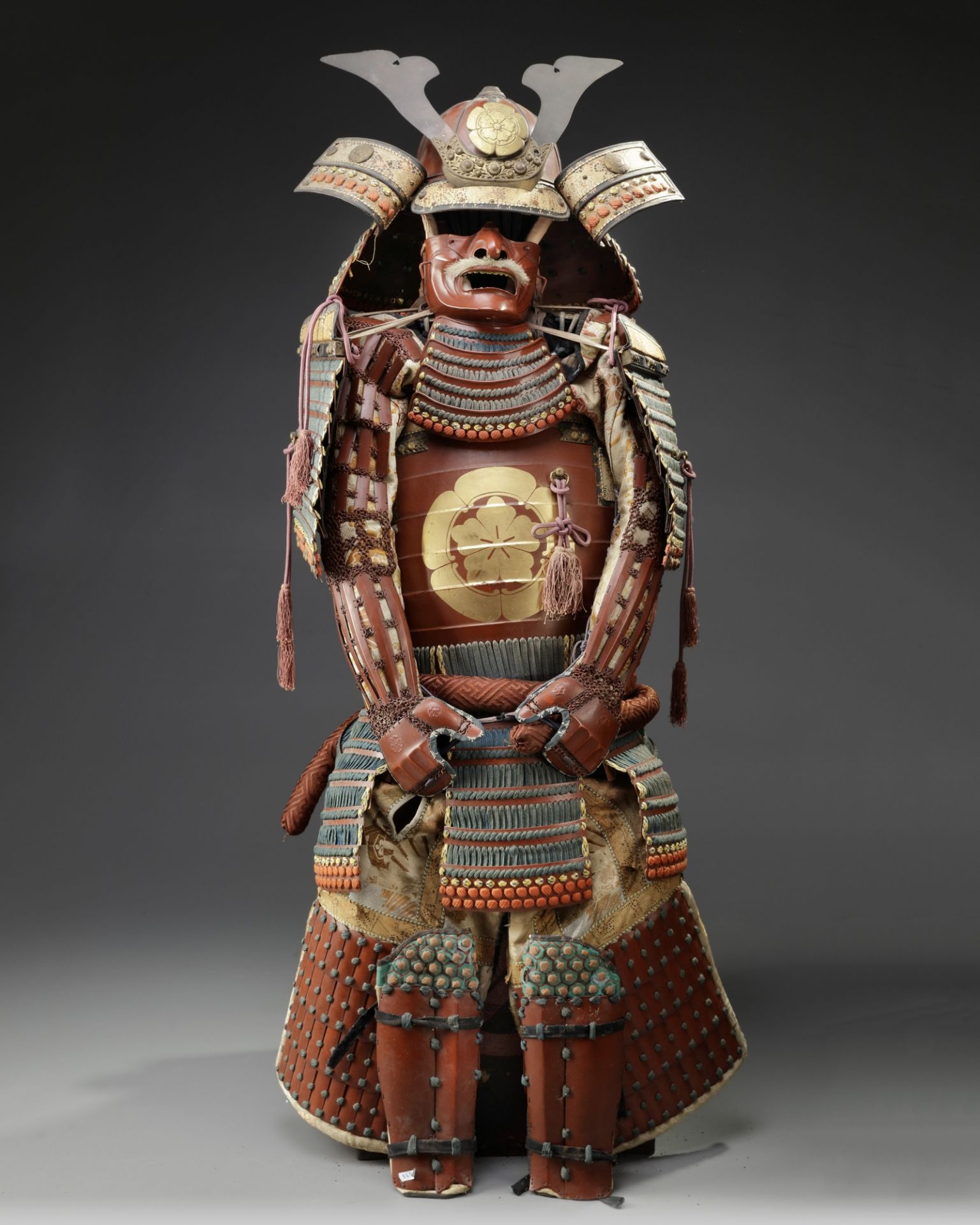 A full size red armor 'yoroi' with original bamboo woven box