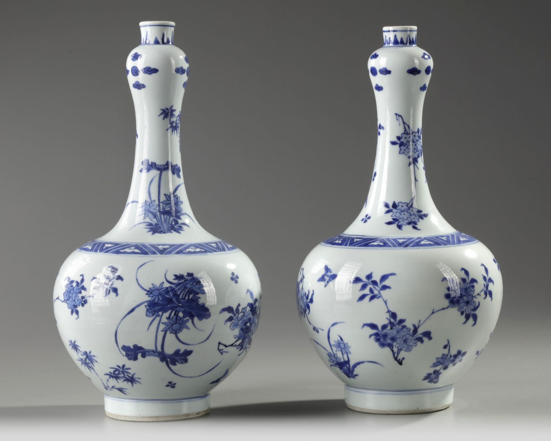 A pair of Chinese blue and white 'floral' bottle vases