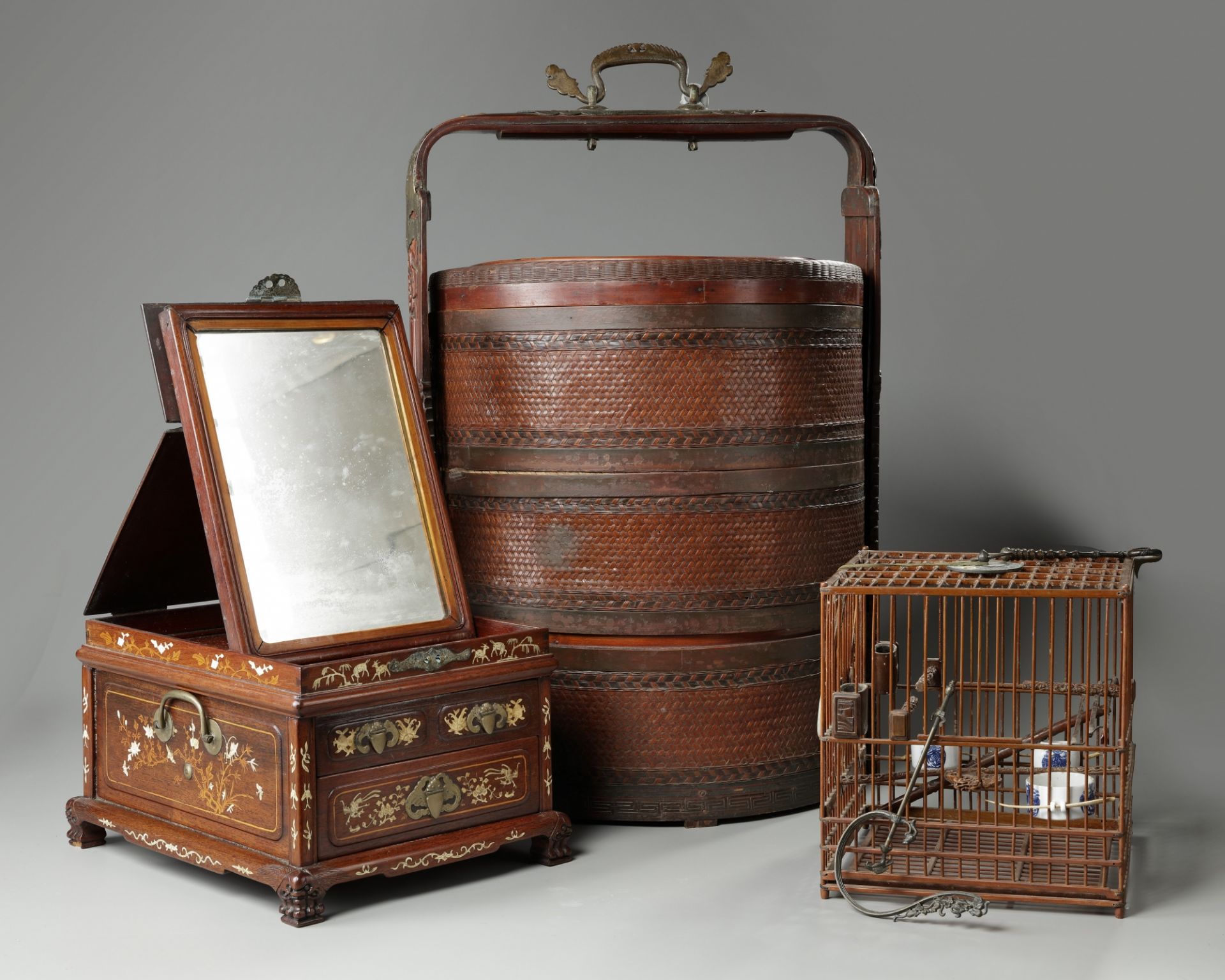 A Chinese bamboo bird cage, a marriage basket, and a bone-inlaid wood mirror box