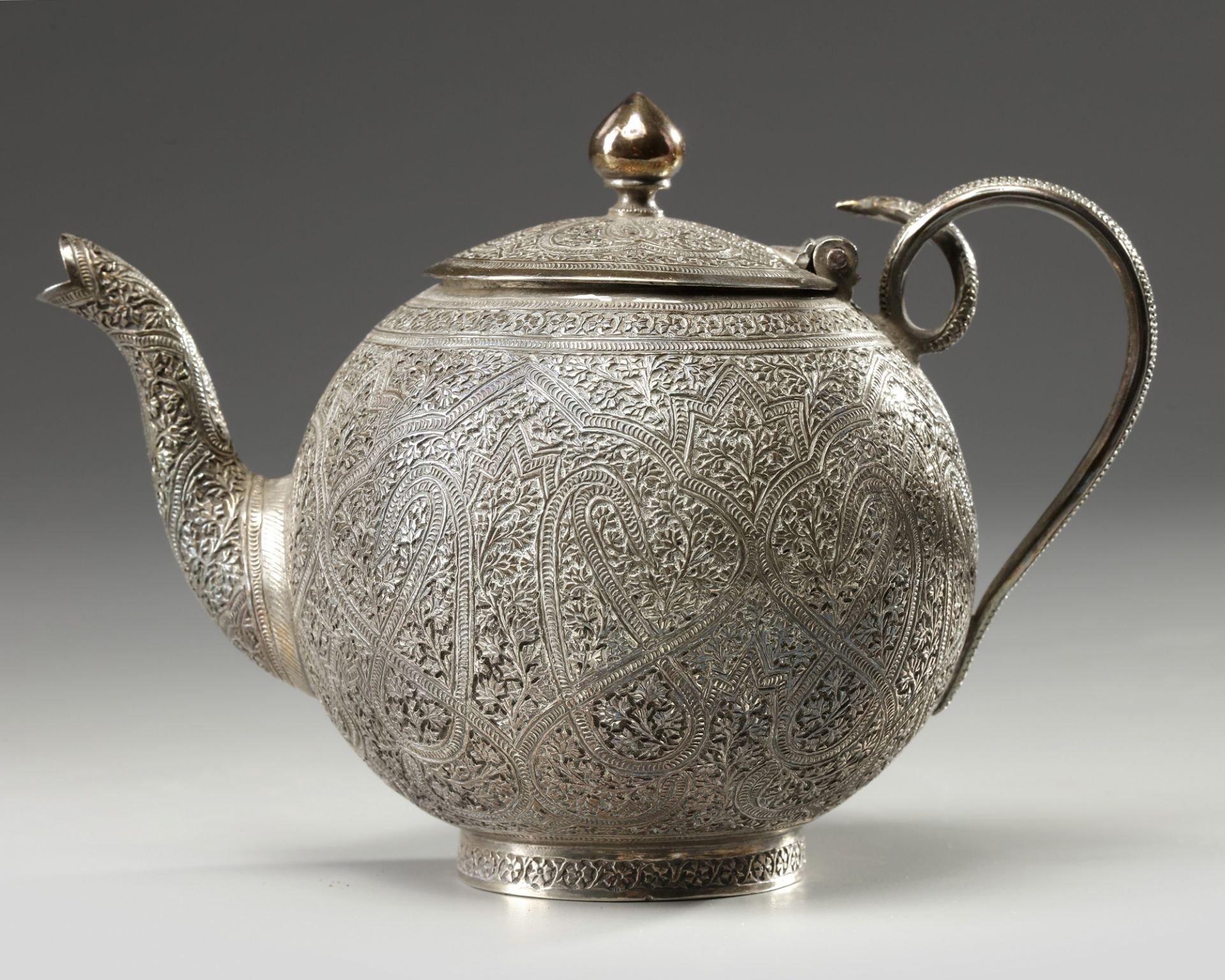 An Islamic Persian silver teapot