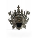 A Mongolian bronze Mahakala-head ritual water pot