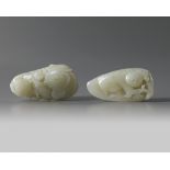 Two large Chinese pale celadon jade ‘boys’ carvings