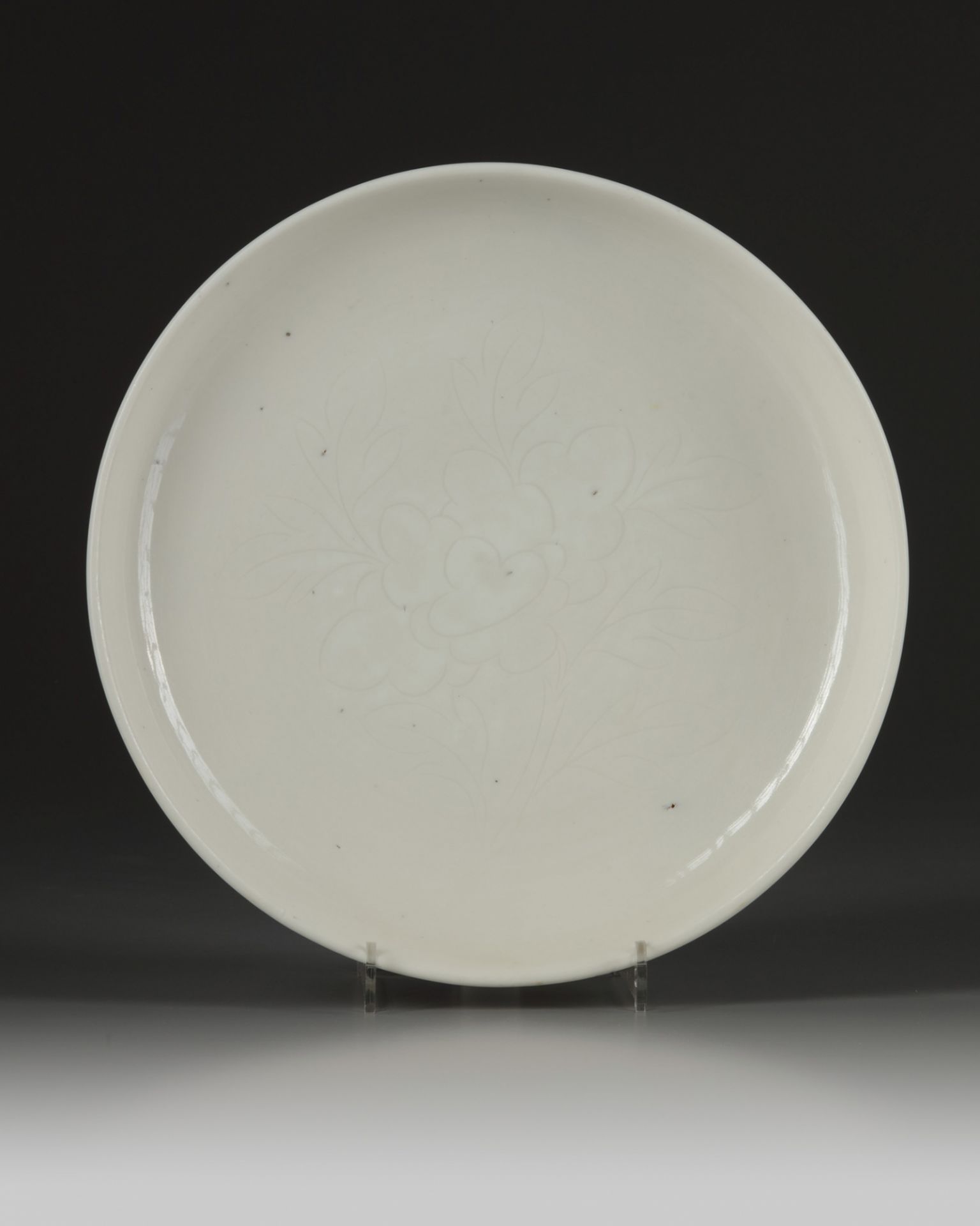 A Chinese Dehua white-glazed incised dish