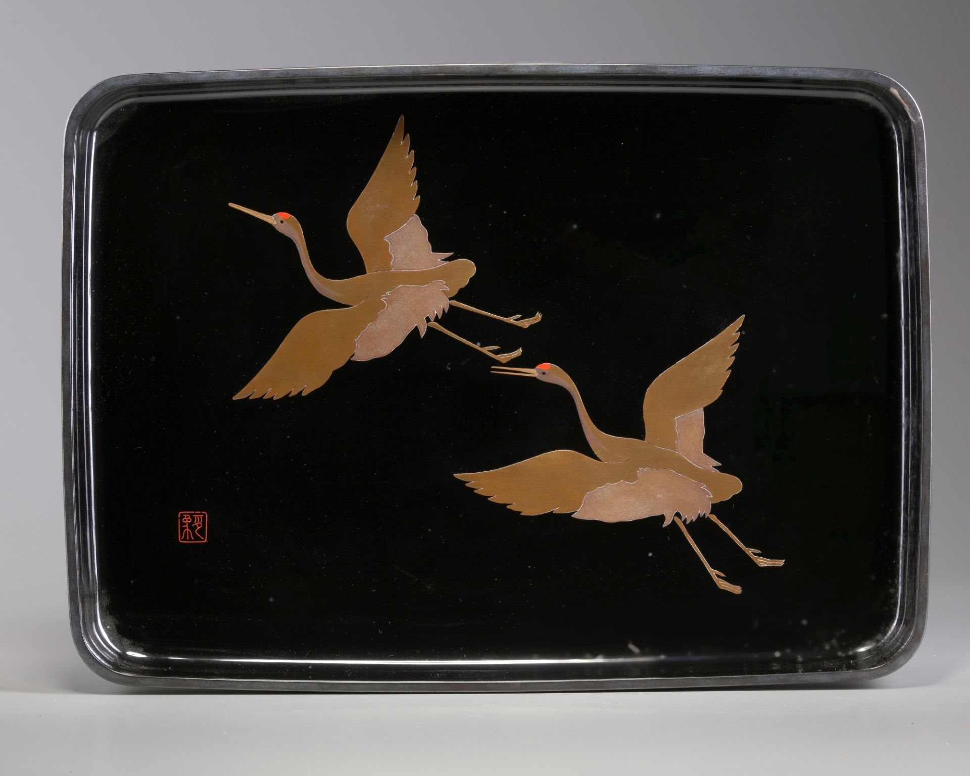 A Japanese lacquer tray decorated with cranes