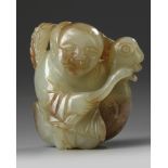 A Chinese celadon and russet jade 'boy and goose' carving