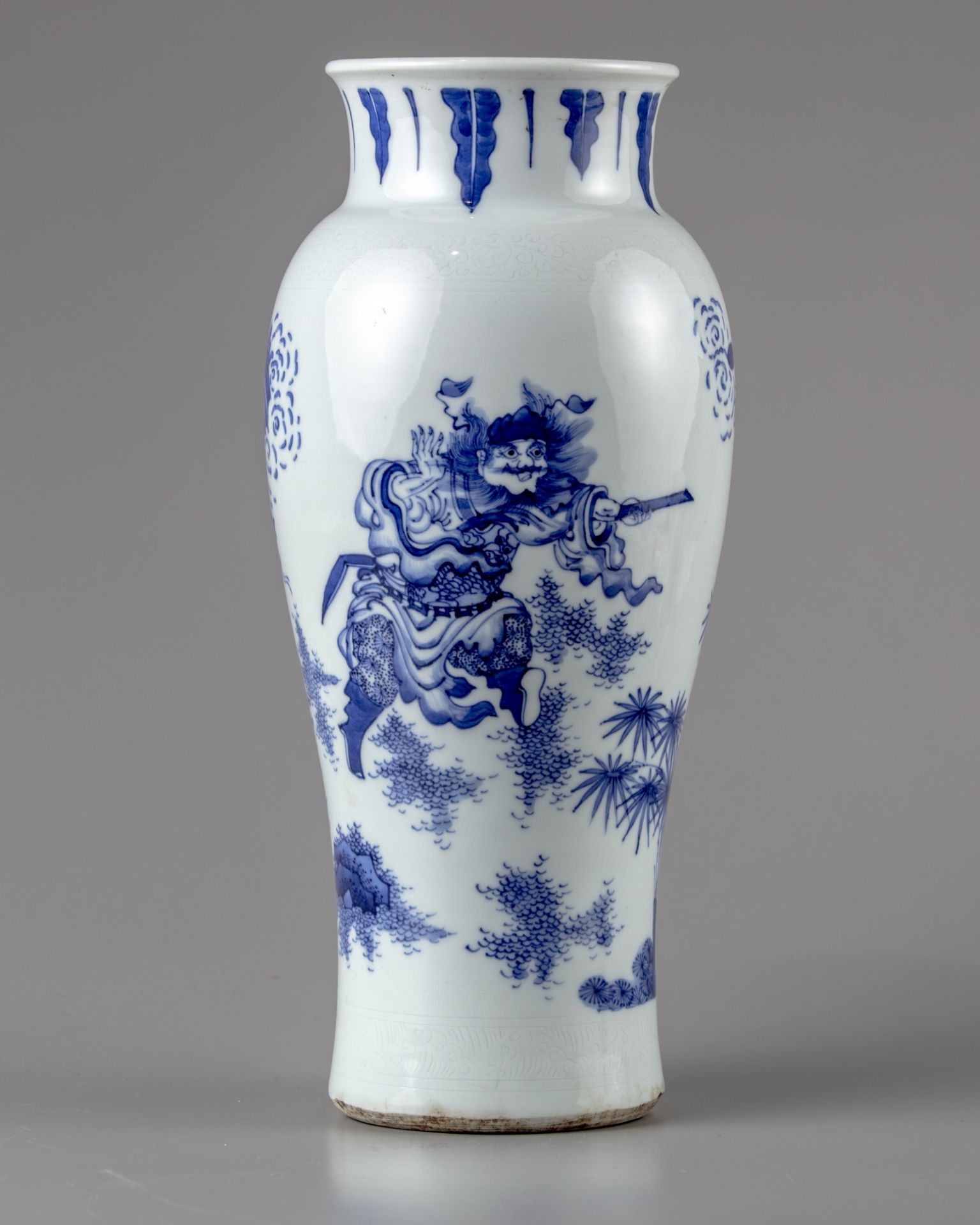 A Chinese blue and white 'Zhong Kui' slender vase