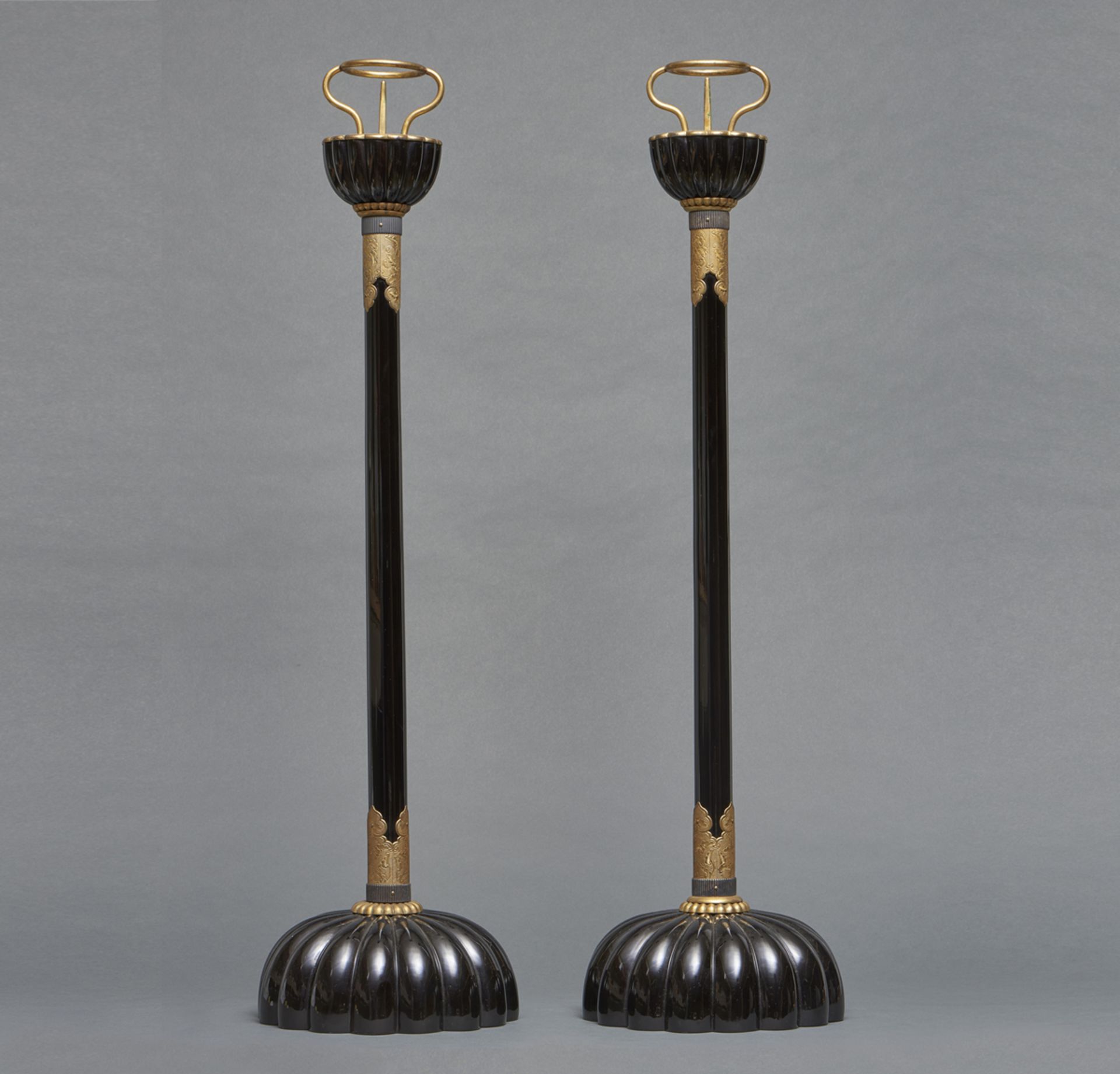 A Set of Japanese black lacquered temple candle sticks