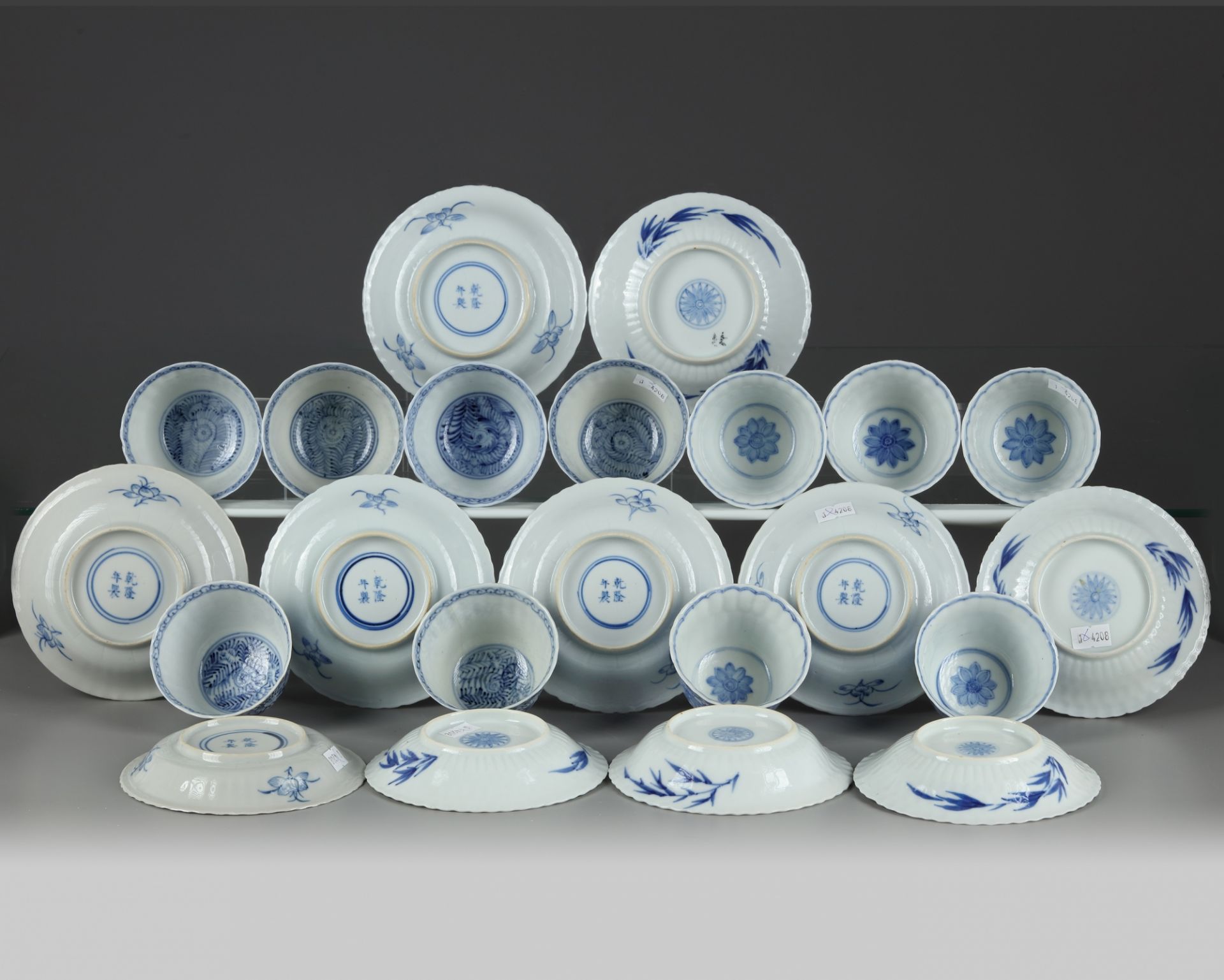 A set and a matched set of Chinese blue and white flower scroll cups and saucers - Image 3 of 4